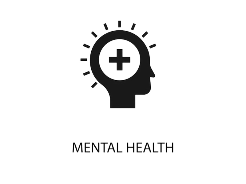 llustration of a silhouette of a head with a cross inside, symbolizing mental health, with the words 'Mental Health' written below.